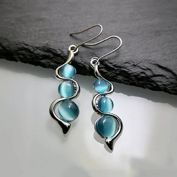 Boucles d'oreilles en cristal bleu pendantes