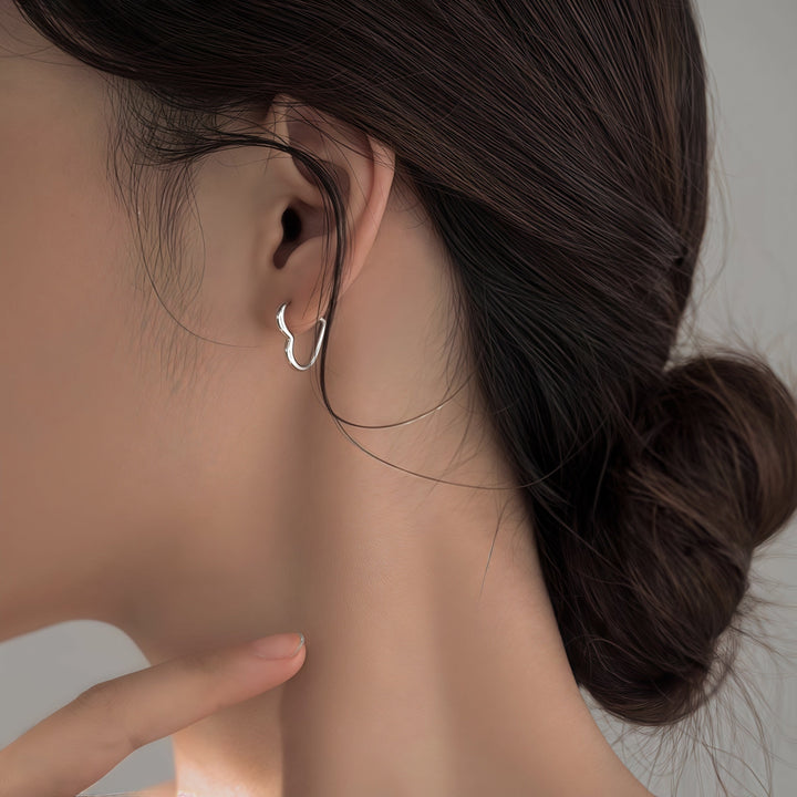 Boucles d'oreilles dorées en acier inoxydable en forme de cœur