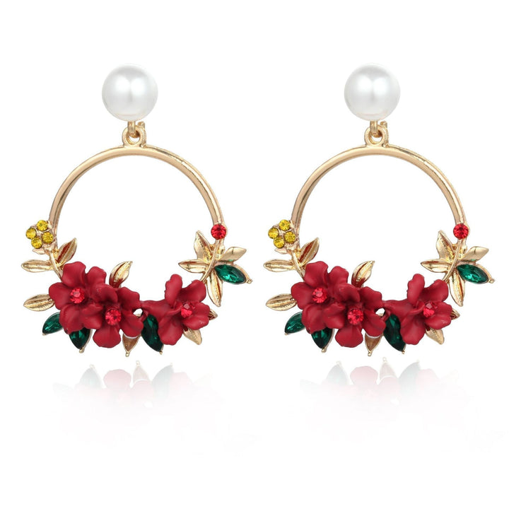 Boucles d'oreilles en or élégantes ornées de fleurs et de perles