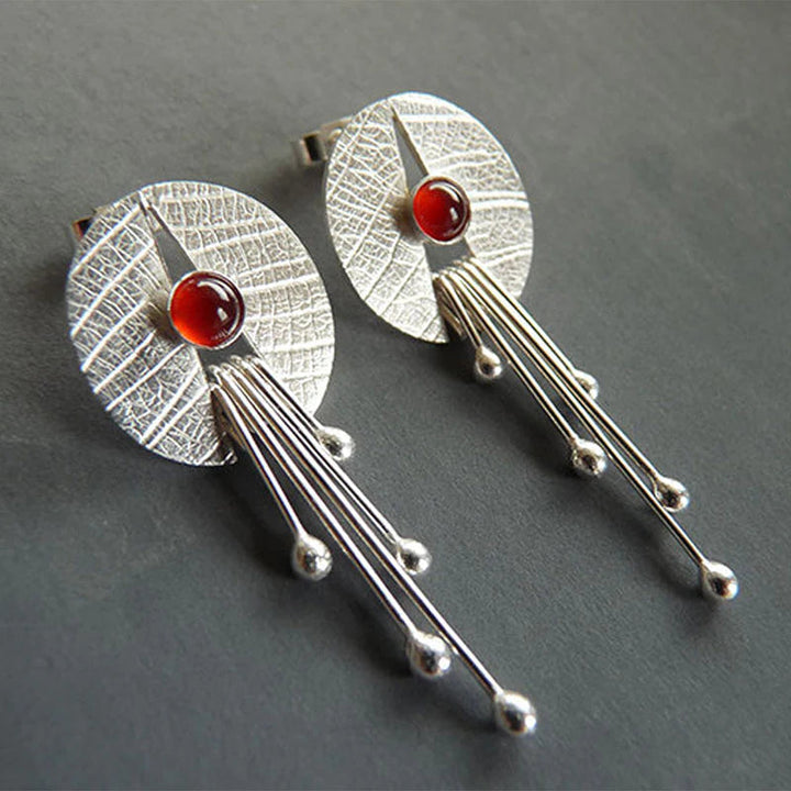 Boucles d'oreilles en pierre creuse rouge suspendues