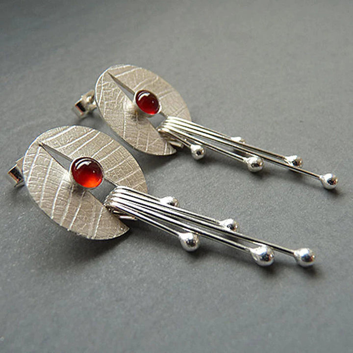 Boucles d'oreilles en pierre creuse rouge suspendues
