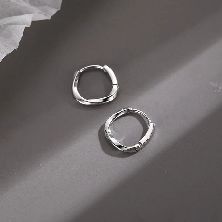Boucles d'oreilles en argent sterling rondes et incrustées