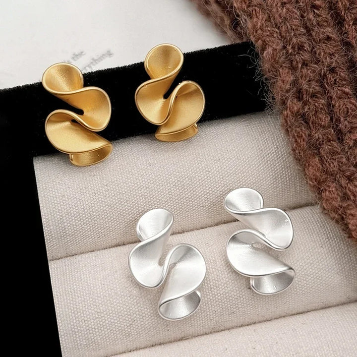 Boucles d'oreilles en forme de fleur en argent sterling et or 18K