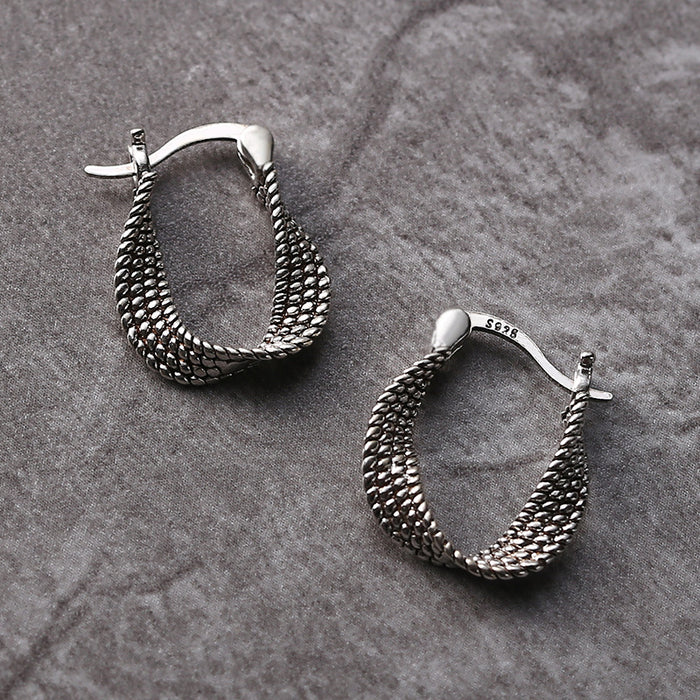 Boucles d'oreilles asymétriques en argent chic